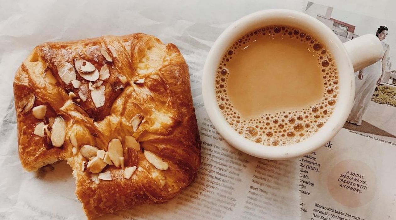 Samuels Sweet Shop coffee next to a danish